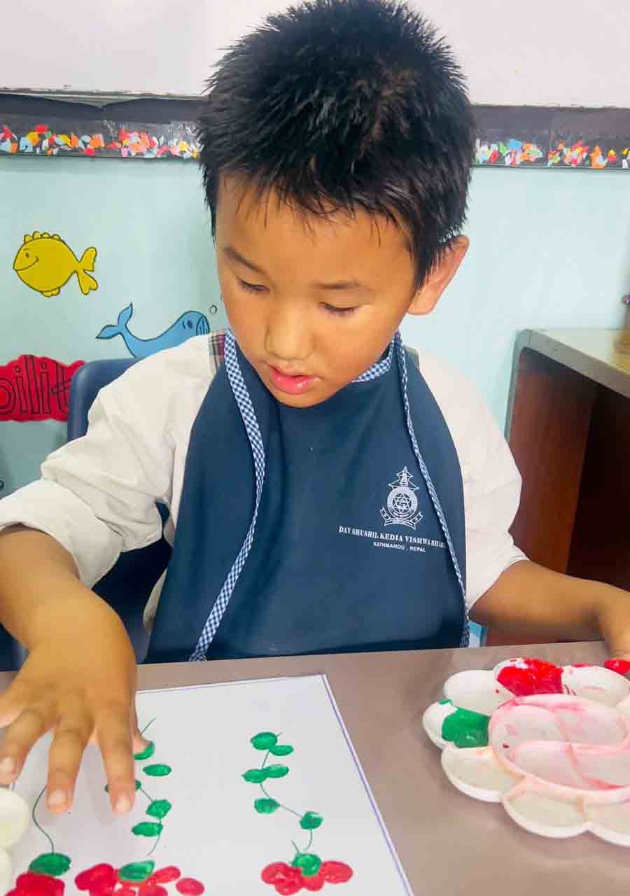 Thumb Printing Activity of DAV Kindergarten