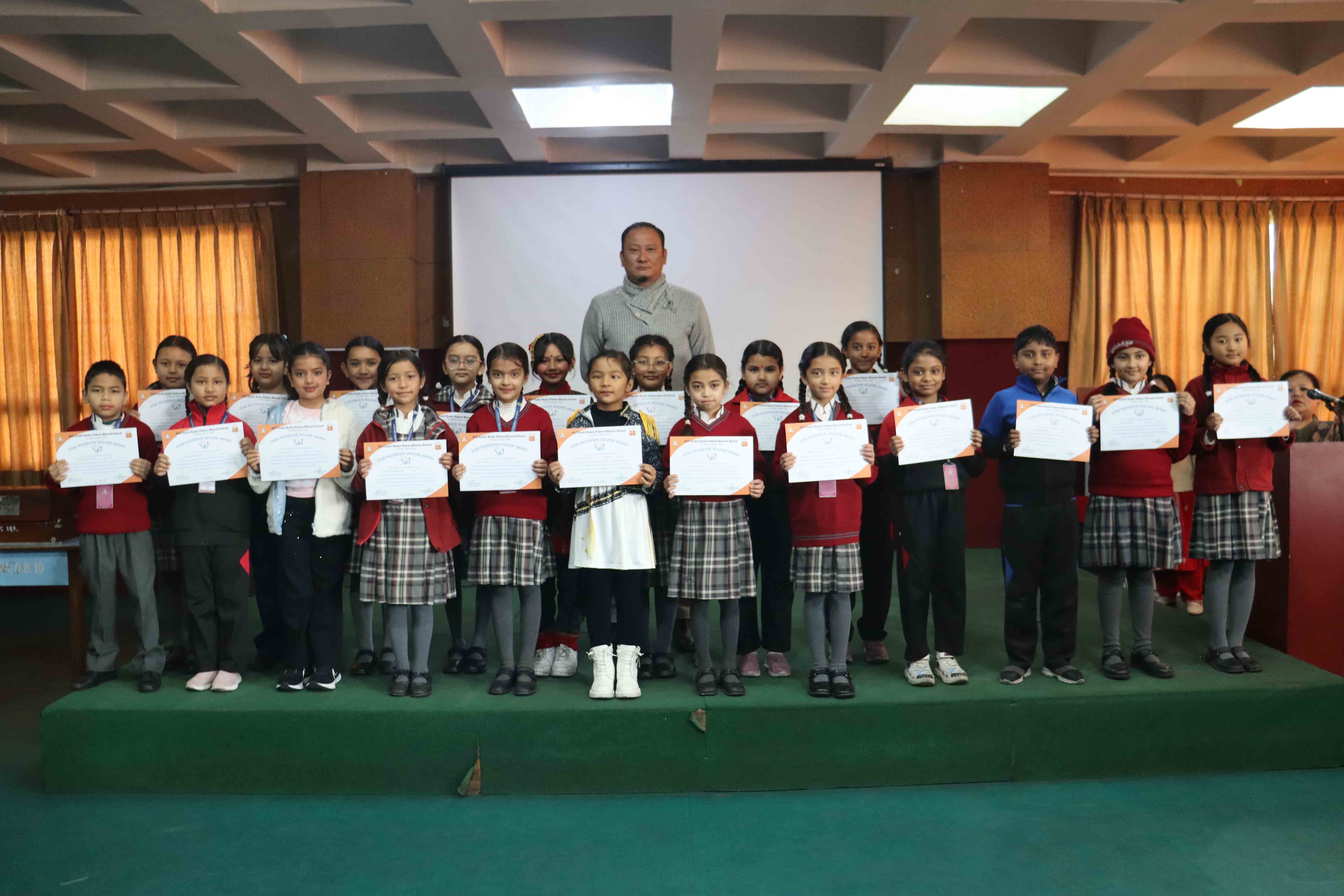 38 Students from Grades III and IV Honoured with Star Notebook Holder Award