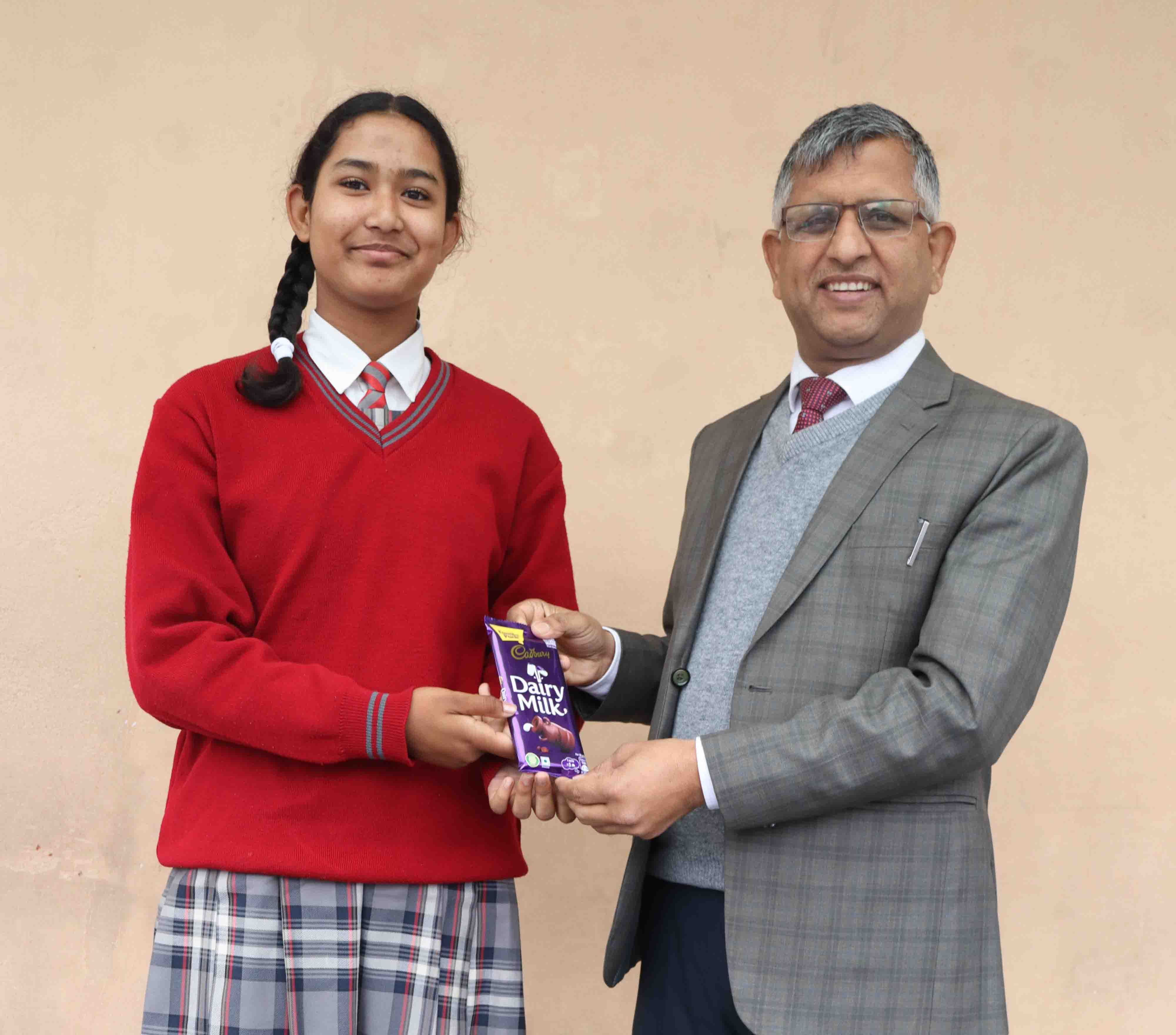 Vice-principal Honours Avanie in the Morning Assembly