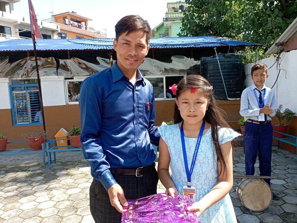 Celebrating student's birthday in assembly